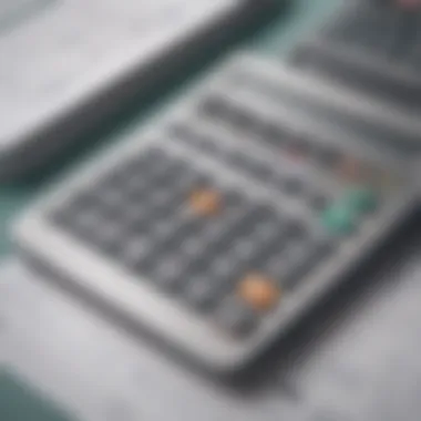 Calculator with financial documents on a desk